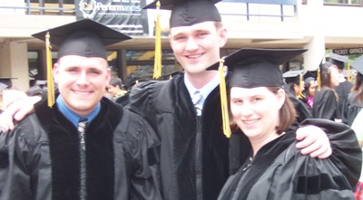 [Andy, Jer, and Steph in regalia]