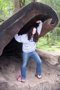 [Mel inside tree stump]